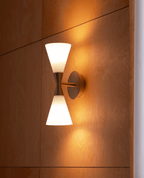 Calden Double Cone Glass Wall Sconce — finish, form and room detail 10
