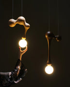 Jenna Sculptural Wood-Finish Globe Pendant Light - product view 3