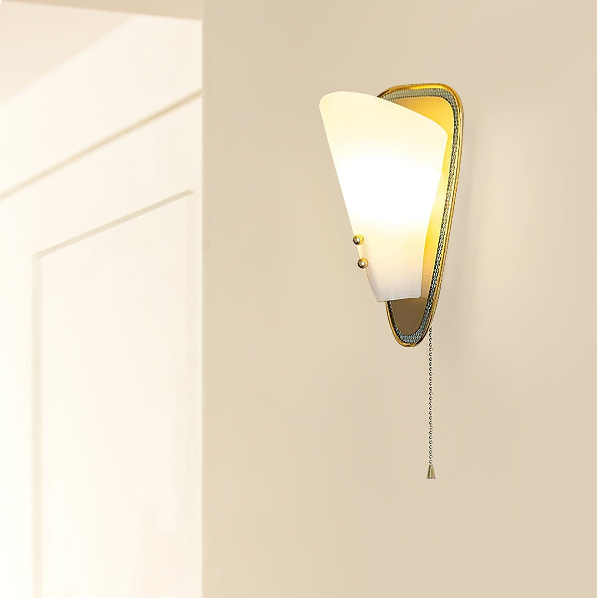 Trevane Triangular Tassel Wall Sconce — finish, form and room detail 2