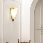Trevane Triangular Tassel Wall Sconce — finish, form and room detail 8