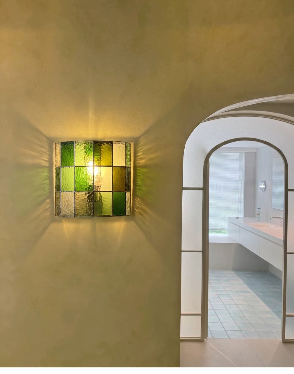 Veltra Faceted Glass Wall Sconce — finish, form and room detail 6