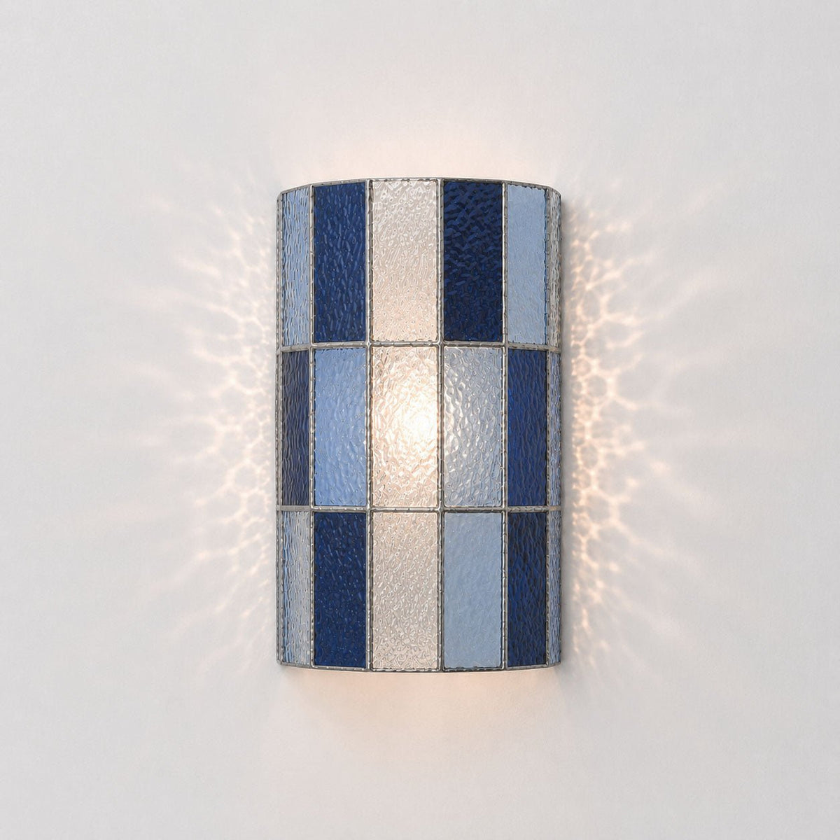 Veltra Faceted Glass Wall Sconce — finish, form and room detail 13